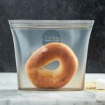 Reusable sandwich bag made from food-grade silicone, with a bagel inside